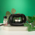 Ceramic Zen Oil Burner – Oval Pebble – Matt Black – black oil burner, main product view